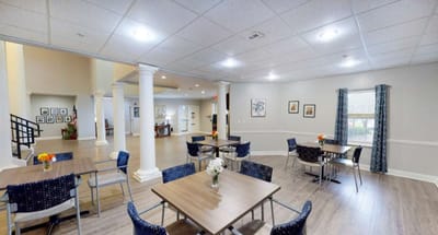 Bright common area with seating and floral decorations