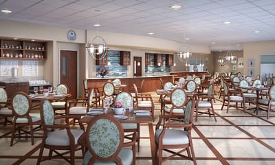 Dining area with neatly arranged tables and chairs