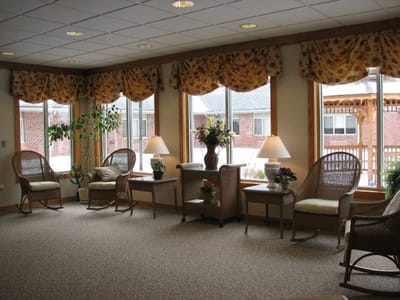 Bright common area with seating and natural light
