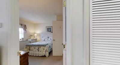 Private resident room with floral bedding