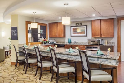 Interior view of a dining area with a bar and seating