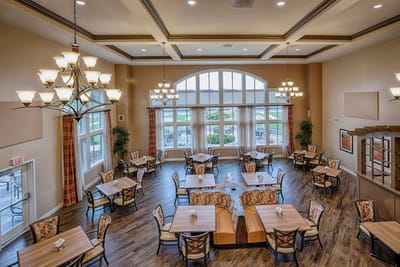 Dining area with tables and large windows