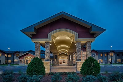 Front entrance of The Stonehaven facility at dusk