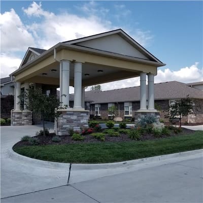 Front entrance of The Villa At Blue Ridge with landscaping