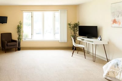 Bright, minimalistic resident room setup