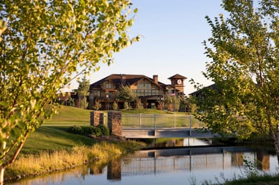 View of a senior living facility with scenic landscaping
