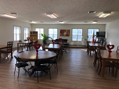 Bright common area with tables and decorations
