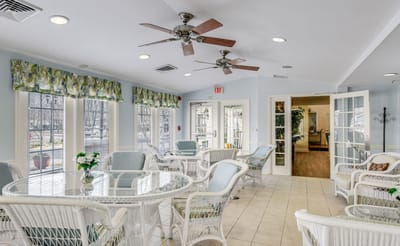 Bright common area with seating and natural light