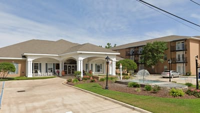 Exterior view of Villa Maria Retirement Center with landscaped gardens