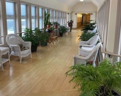 Bright corridor with plants and seating
