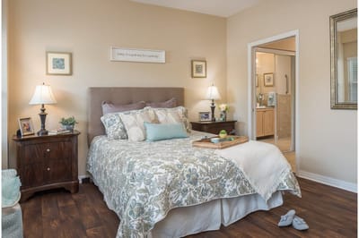 Cozy resident room with bed and decor