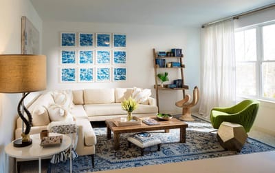 Bright, stylish common area with seating and decor