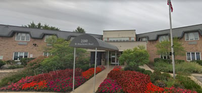 Front entrance of Wynscape facility with flower garden