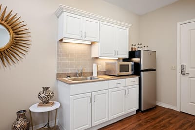 Bright kitchen area with modern appliances