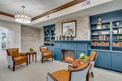 Cozy lounge area with comfortable seating and fireplace