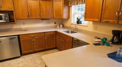 Bright interior kitchen with wooden cabinets