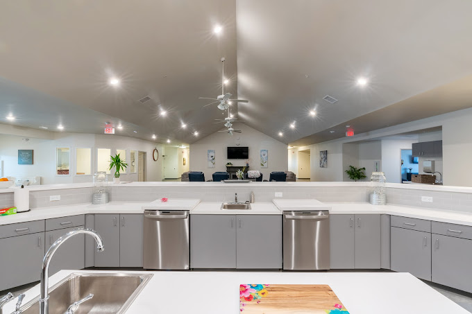 Bright and spacious common area with kitchen