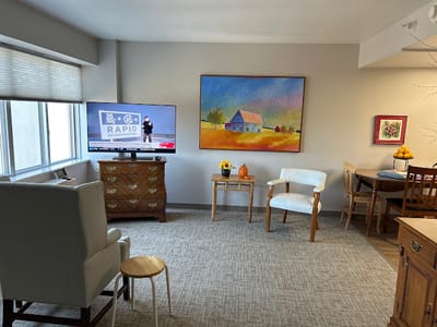 Cozy interior room with a television and artwork