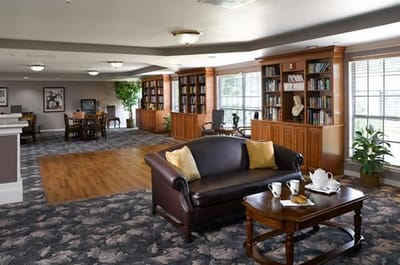 Common area with seating and bookshelves
