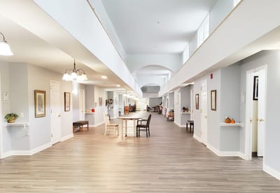 Bright interior hallway of the facility with seating areas