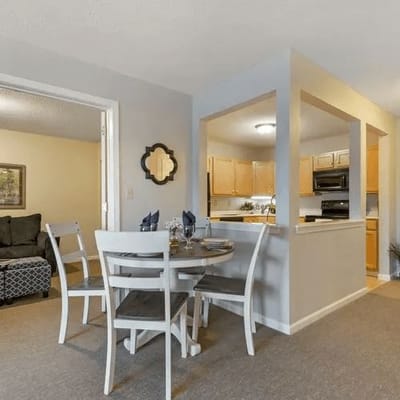 Dining area with a round table and chairs