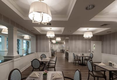 A dining room setup in a senior living facility