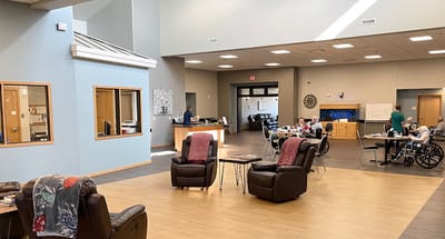 Interior view of a common area with residents