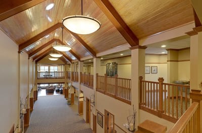 Interior view of a common area with wooden ceilings