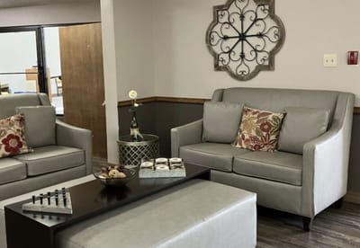 Comfortable living room with sofas and decorative accents