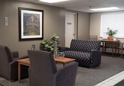 Seating area in a communal space with artwork
