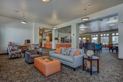 Bright common area with seating and decor