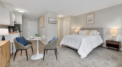 Cozy resident room with a dining table and bed