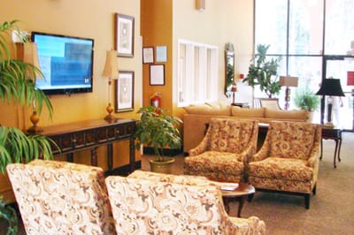 Cozy lobby area with seating and plants