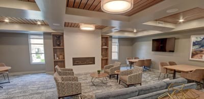 Common area with seating and fireplace