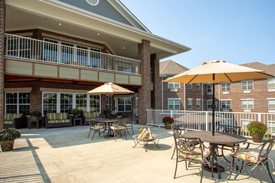Outdoor patio space with seating and umbrellas