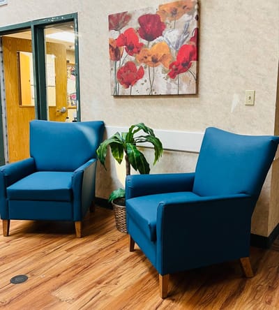 Cozy interior seating area with vibrant wall art
