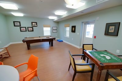 Common activity room with billiards table and games
