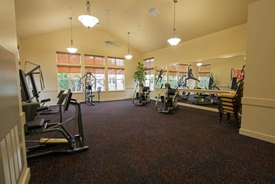 Interior view of a fitness room with gym equipment