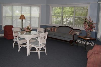 Common area with seating and a dining table