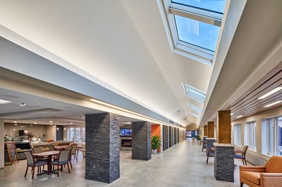 Interior view of a spacious common area with natural light