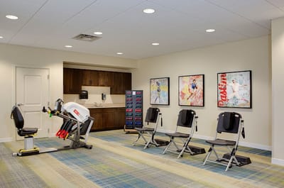 Well-equipped fitness area in an assisted living facility
