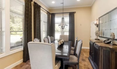 Interior dining room with a large table and chairs