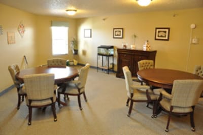 Bright common area with tables and chairs