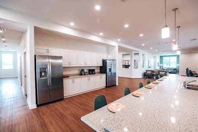 Bright dining area with a modern kitchen