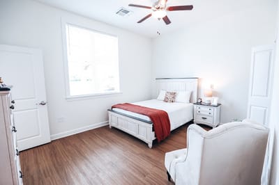 Bright, well-furnished resident bedroom