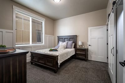 Cozy resident room with a bed and decor