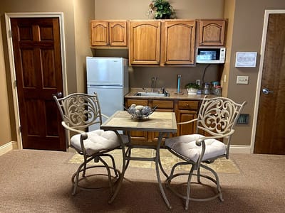 Cozy kitchenette area with table and chairs