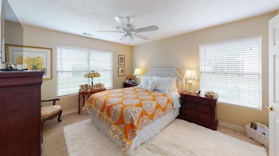 Cozy private bedroom with natural light