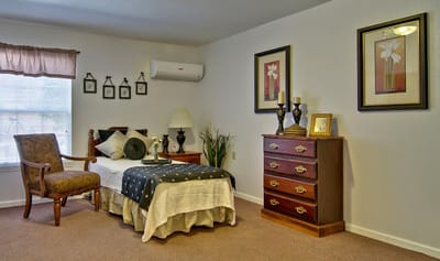 Cozy resident room with furnishings and decor