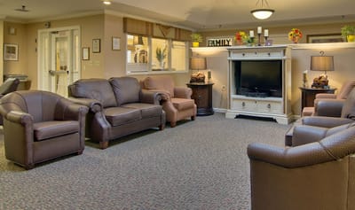 Common area with seating and a television